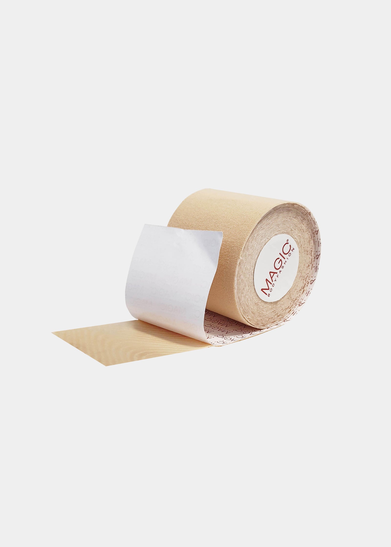 A roll of beige-colored luxury lace tape with a white label in the center.