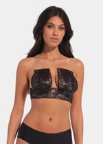 Front view of a model wearing the black Luxury Lace Boob Tape, showcasing the lace-finish adhesive tape applied to lift and shape the bust while creating an elegant, invisible look under clothing.