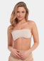A woman wearing a white strapless top made with adhesive boob tape.