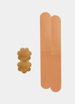 Still product image of the mocha-colored Celebrities Breast Tape, showcasing the adhesive breast tape pieces designed to lift and support the bust for an invisible finish under clothing.