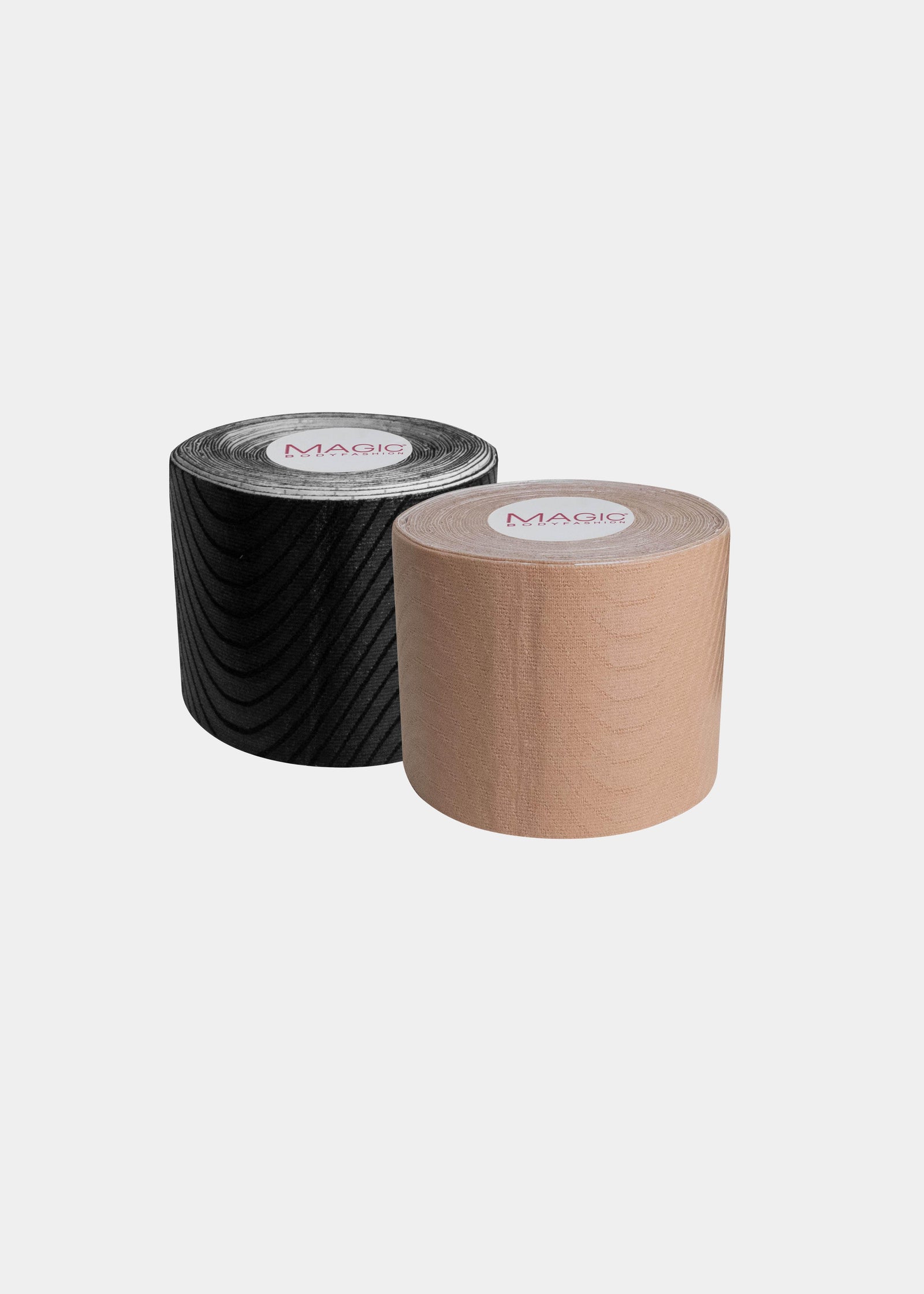Still product image of the Double Sticky Boob Tape rolls in black and latte, showcasing both double-sided adhesive tape rolls designed to lift and support the bust for invisible styling.