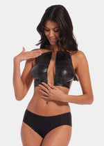 Front view of a model wearing the black Double Sticky Boob Tape, showing the double-sided adhesive tape applied to lift and support the bust while creating a smooth, invisible look under clothing.