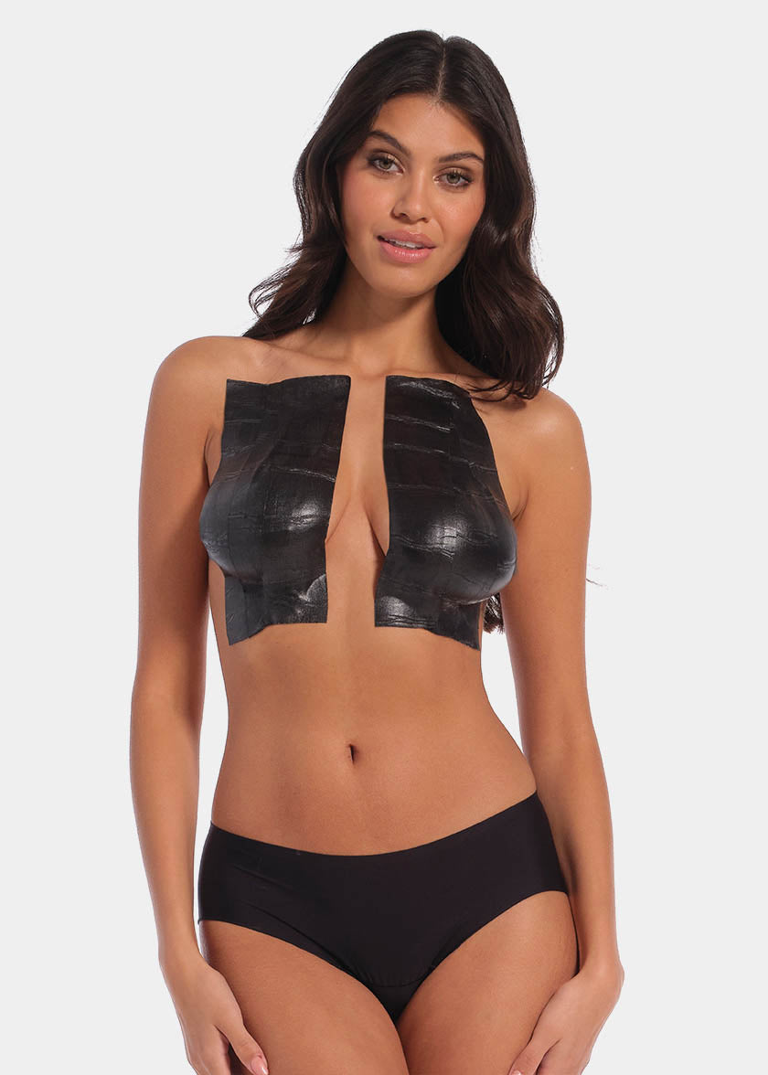 Front view of a model wearing the black Double Sticky Boob Tape, showing the double-sided adhesive tape applied to lift and support the bust while creating a smooth, invisible look under clothing.