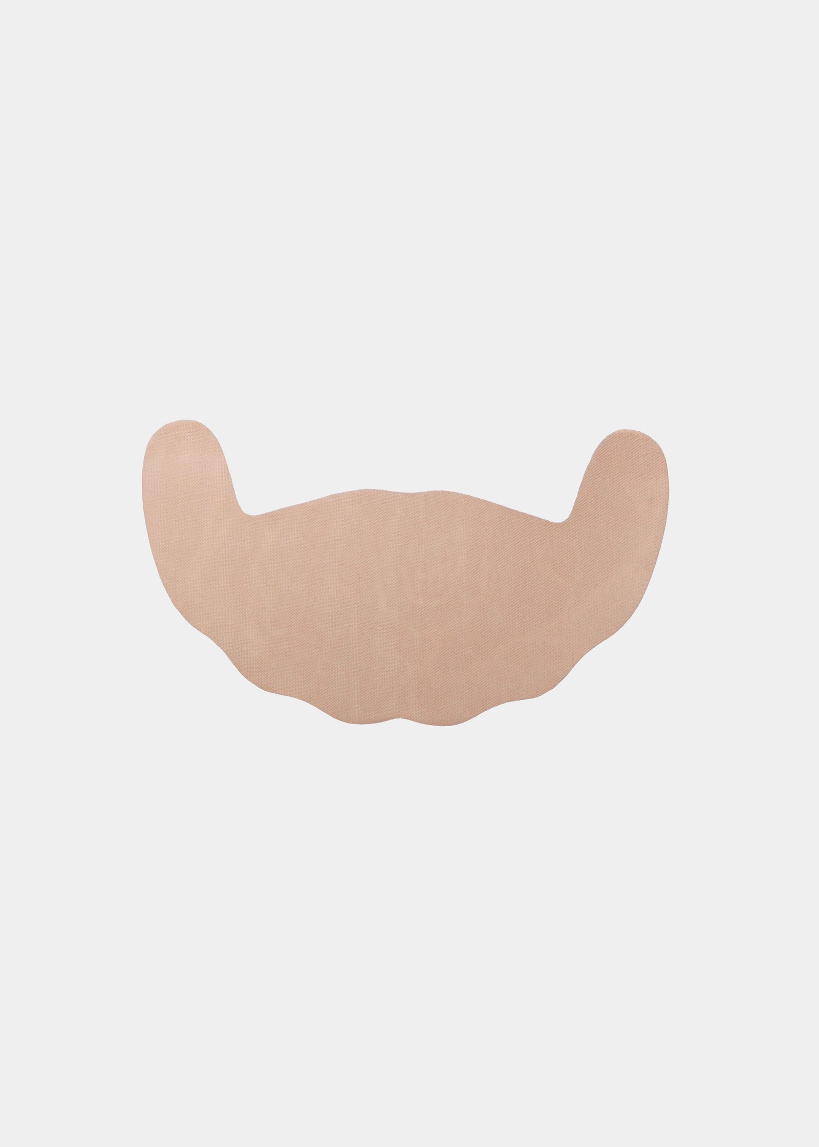 Still product image of Freedom Form in latte, adhesive breast tape strips. Skin-toned waterproof lifting strips with smooth surface and curved shape, designed for strapless and backless support without closures or straps.