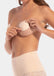 Front view of a model wearing the latte-colored MAGIC Hide Your Nipples covers, showcasing the soft fabric nipple covers that provide smooth, discreet coverage with a natural, invisible look under clothing.