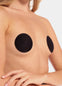 Front view of a model wearing the black MAGIC Hide Your Nipples covers, showcasing the soft fabric nipple covers that provide smooth, discreet coverage with a natural, invisible look under clothing.