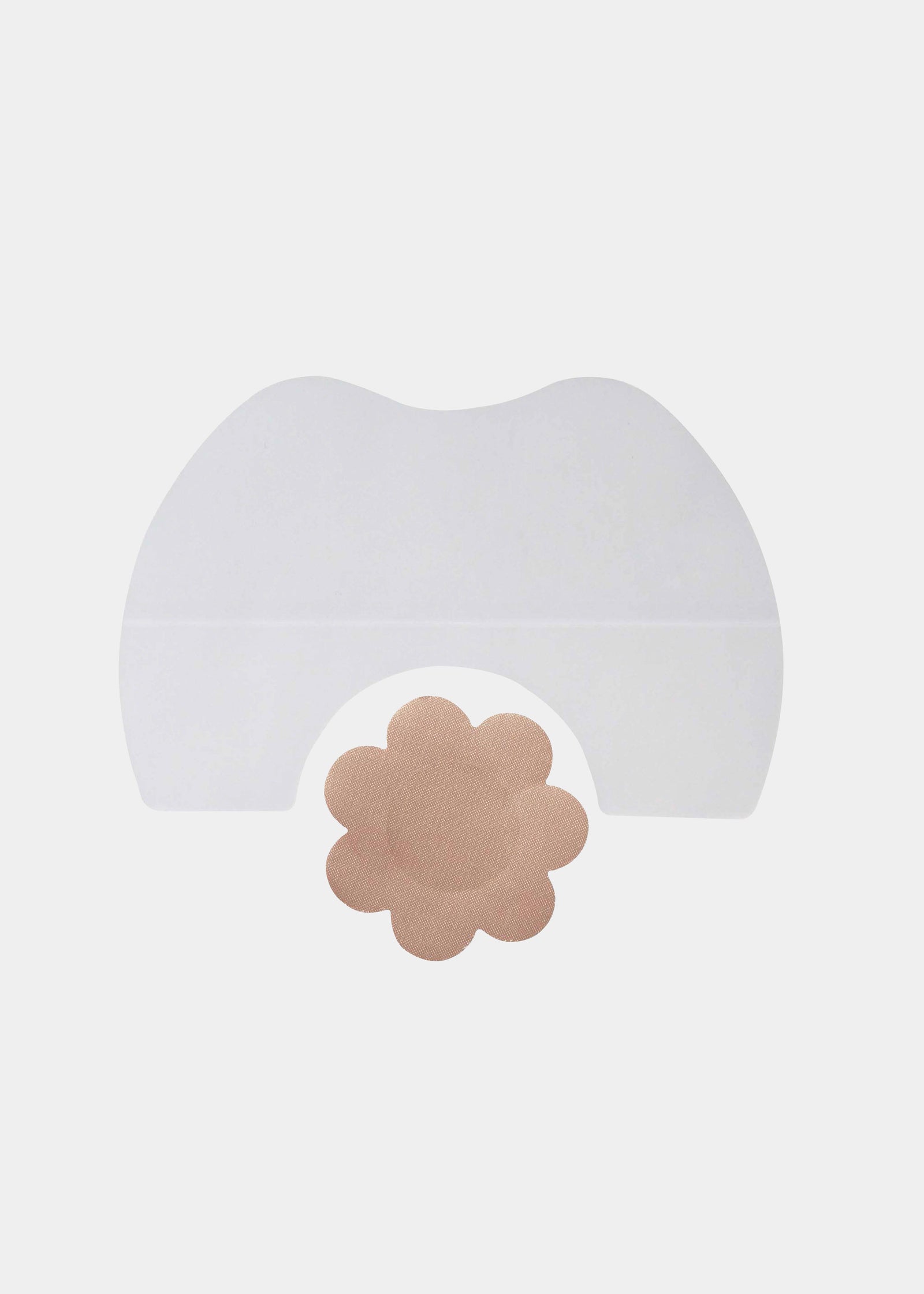 Still product image of the clear MAGIC Lift Solution, showcasing the transparent silicone lift tapes and flower-shaped nipple covers designed to lift and support the bust with an invisible finish.