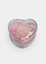 Heart-shaped container with a label 'Magic' on a white background