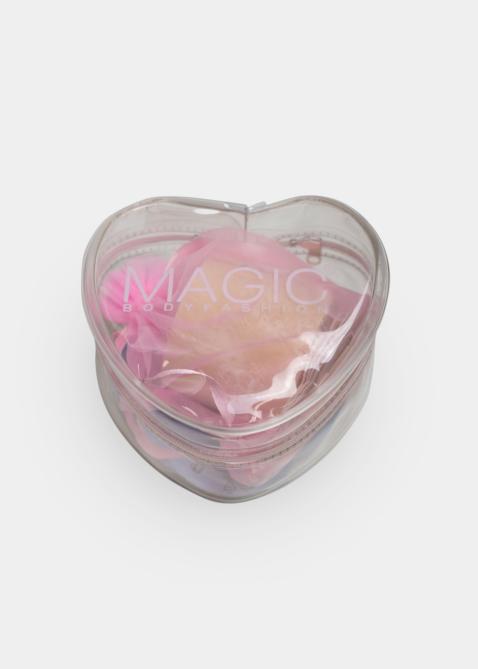 Heart-shaped container with a label 'Magic' on a white background