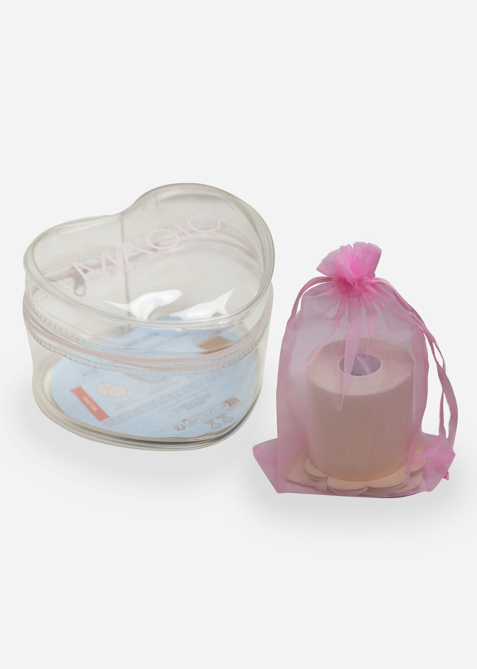 Clear heart-shaped container with a pink drawstring bag with tapes on a white background