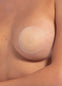 Ultra thin and soft skin-friendly silicone nipple covers worn by a model, appearing invisible under clothing.