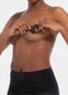 Front view of a model wearing the chocolate-colored Silicone Nipple Covers, showcasing the soft, skin-friendly silicone covers that provide smooth, discreet coverage with an invisible finish under clothing.