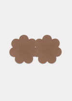 Still front product view of the mocha-colored Secret Covers, showcasing the smooth, soft nipple covers designed for discreet coverage and an invisible look under clothing.