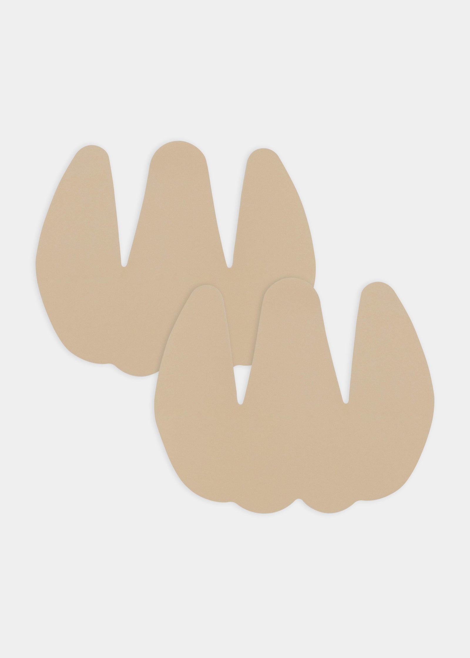 Still front product view of the caramel-colored Sculpting Breast Tape, showcasing the adhesive lift tape pieces with a smooth finish and skin-friendly adhesive designed to support and shape the bust.