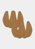Still front product view of the mocha-colored Sculpting Breast Tape, displaying the adhesive lift tape pieces with a smooth finish and skin-friendly adhesive designed to support and shape the bust.
