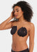 Front view of a model wearing the black Sculpting Breast Tape, showing how the adhesive tape lifts and supports the bust while keeping the shoulders, back, and cleavage free for an invisible look under clothing.