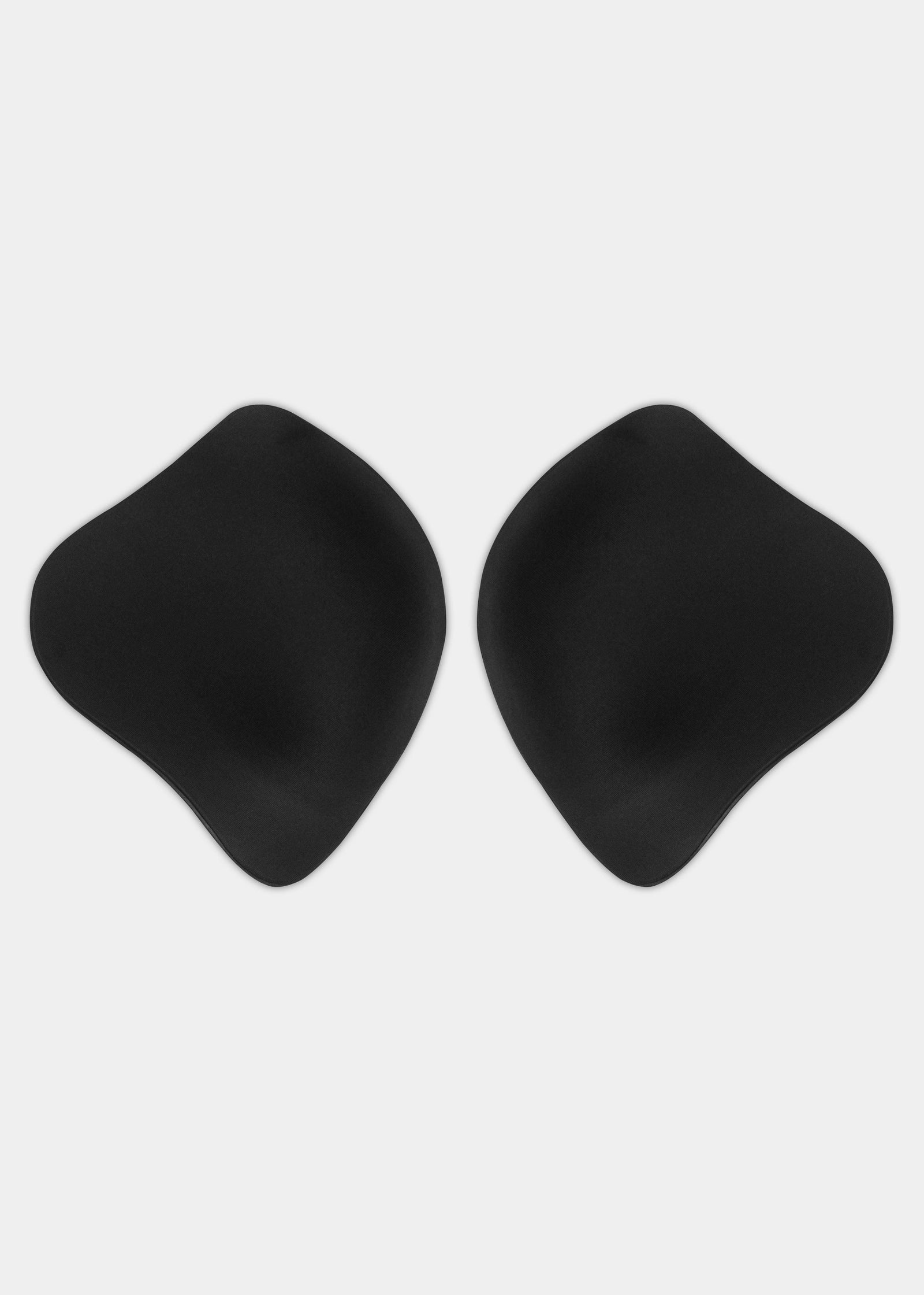 Still front product view of the Ultimate Invisibles adhesive bra cups, showcasing the two separate lightweight cups with a smooth outer finish and skin-friendly adhesive lining for a seamless, backless and strapless solution.