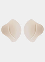 Close-up view of the inside of the Ultimate Invisibles bra cups, highlighting the skin-friendly adhesive layer with an adhesive-free center for added comfort and a smooth, lightweight construction.