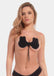 Front view of a model wearing the Va-Va-Voom Lift adhesive bra, standing naturally to showcase the strapless, backless design that lifts and shapes the breasts while providing smooth coverage and a seamless, invisible look under clothing.