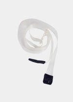 Still product image of the black Low Back Strap, featuring a soft, durable silicone strap with hook-and-eye ends designed to create a low-back effect with any bra that has a back closure.