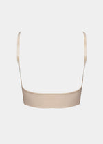 Still back product view of the latte-colored Bamboo Low Back Bra, showcasing the smooth low-back design, seamless finish, and adjustable spaghetti straps for a clean, invisible look under low-back outfits.