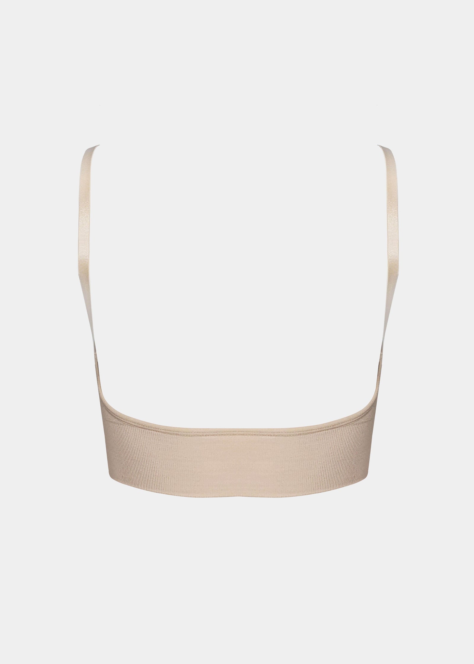 Still back product view of the latte-colored Bamboo Low Back Bra, showcasing the smooth low-back design, seamless finish, and adjustable spaghetti straps for a clean, invisible look under low-back outfits.