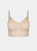 Still front product view of the latte-colored Bamboo Low Back Bra, highlighting the seamless, wireless design in soft bamboo fabric with built-in support, removable inlay pads, and adjustable spaghetti straps.