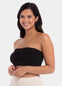 Front view of a model wearing the black Bamboo Bandeau Bra, a strapless wireless bra made from soft, eco-friendly bamboo fabric. The seamless design features removable pads for natural shaping and a smooth, comfortable fit ideal under strapless outfits