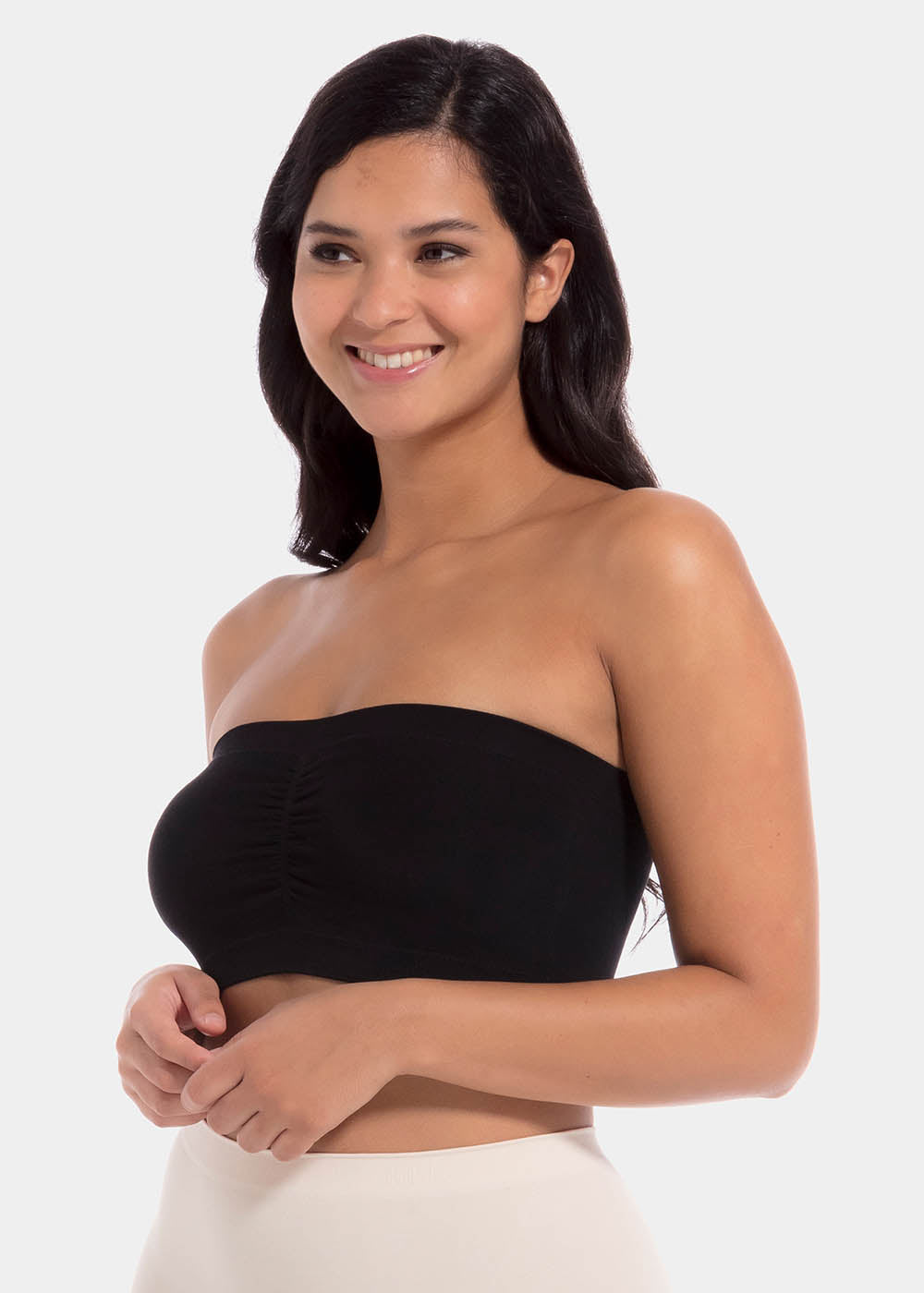 Front view of a model wearing the black Bamboo Bandeau Bra, a strapless wireless bra made from soft, eco-friendly bamboo fabric. The seamless design features removable pads for natural shaping and a smooth, comfortable fit ideal under strapless outfits