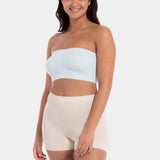 Front view of a model wearing the soft blue Bamboo Bandeau Bra, featuring a strapless, wireless design in ultra-soft bamboo fabric with removable pads and a smooth, seamless fit.