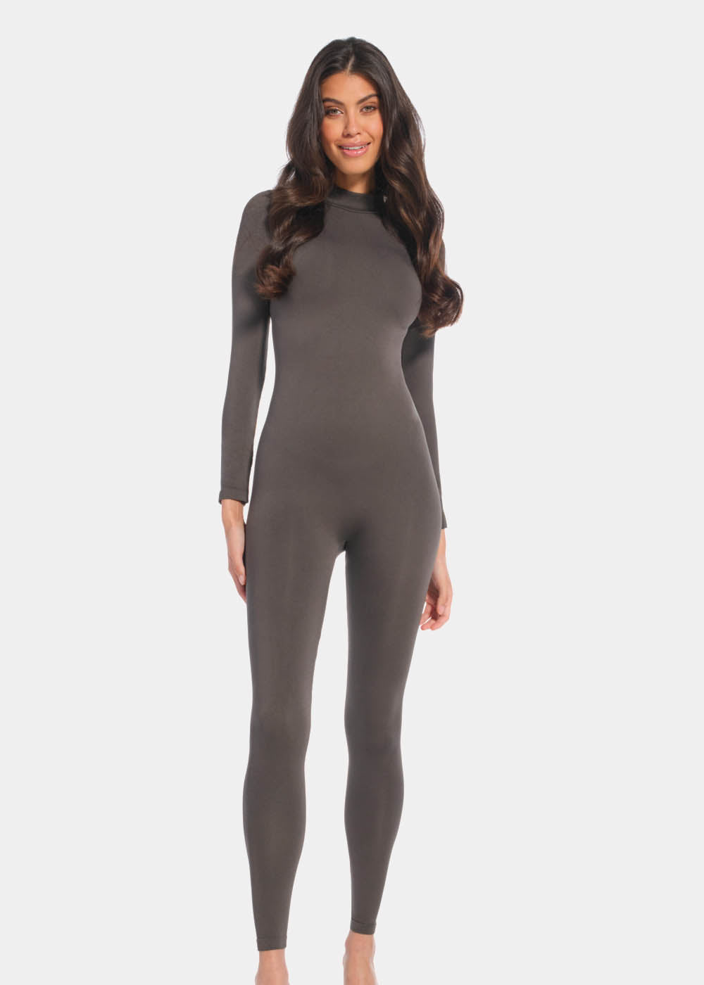 Front view of a model wearing the chocolate-colored Bodycon Jumpsuit, featuring a full-length, long-sleeved seamless design with soft, stretchy fabric that hugs the curves and provides flattering bust support.