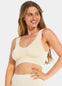 Woman wearing a cream Bamboo Comfort Bra against a white background