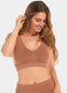 Woman wearing a brown Bamboo Comfort Bra and leggings on a white background