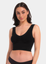 Front view of a model wearing the black Bamboo Shape Bra, featuring a soft, wireless design made from eco-friendly bamboo fabric. The bra includes built-in support, removable inlay pads for shaping, a wide supportive band under the bust, and wider straps for added comfor