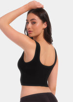 Back view of a model wearing the black Bamboo Shape Bra, showcasing the smooth, seamless bamboo fabric, wide comfortable straps, and a supportive band that provides a secure, shaping fit.