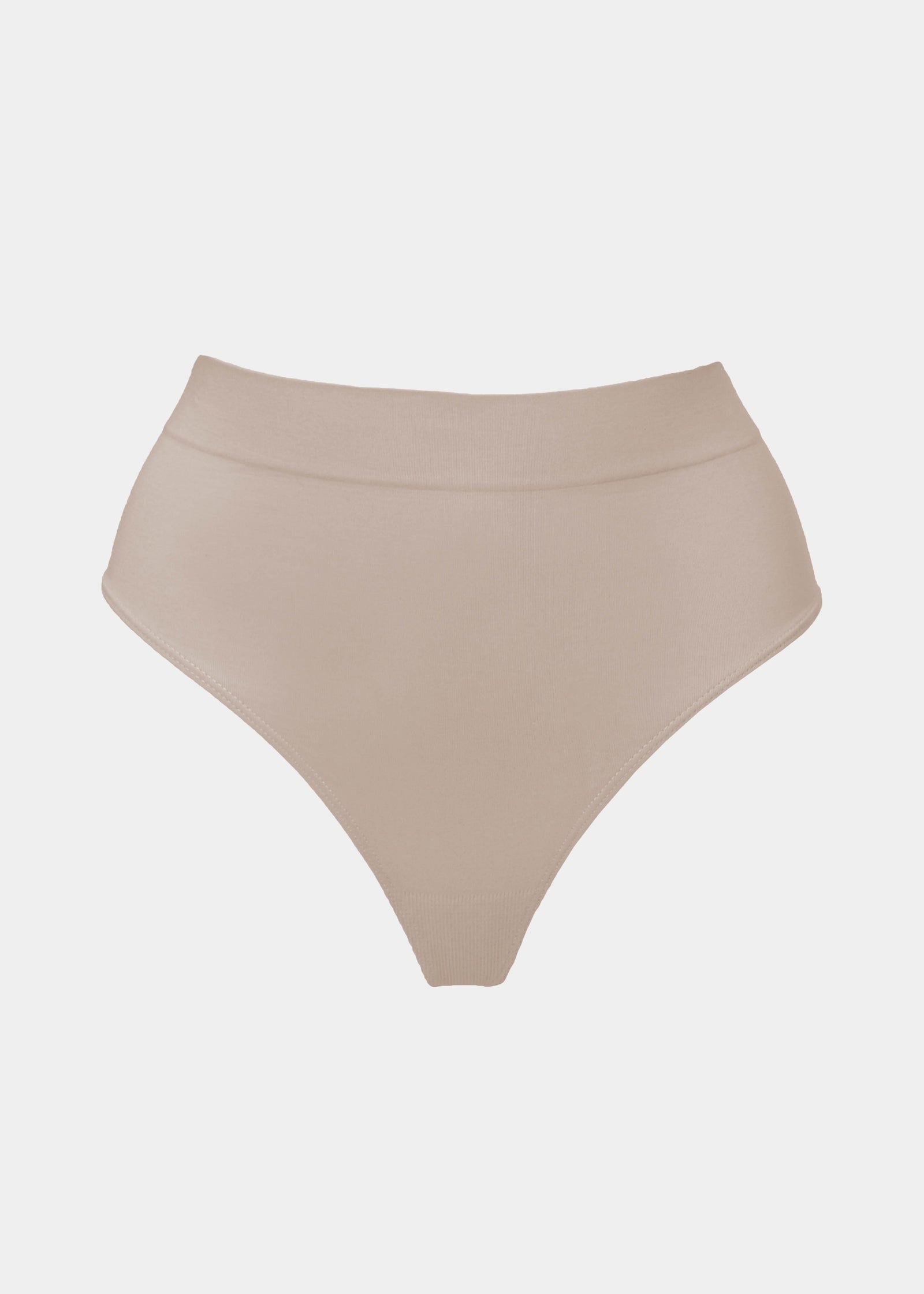 Still front product view of the cappuccino Comfort Thong, highlighting the soft, seamless fabric, smooth waistband, and minimal design for an invisible look under clothing.