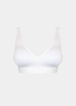 Front product view of the white Comfort Plunge Bra, highlighting the deep V-neckline, soft seamless fabric, wireless design, and smooth, clean finish with wide supportive straps.