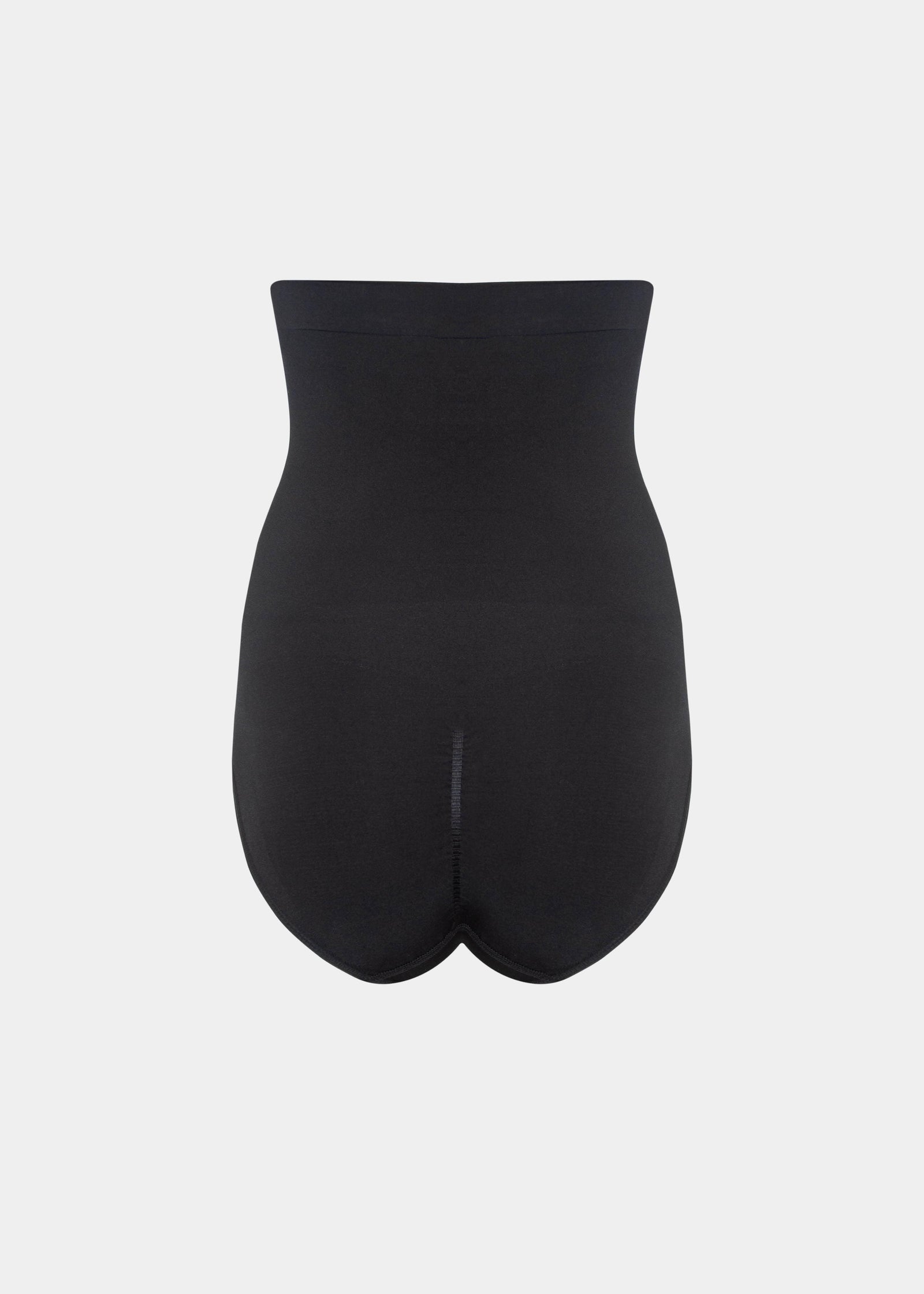 Back view of a model wearing the black Comfort Waistnipper Brief, showcasing the high-waisted seamless fit with a smooth finish and subtle lift-enhancing zone at the back.