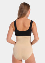 Back view of a model wearing the Comfort Waistnipper Brief, showcasing the high-waisted seamless design with a smooth finish and a subtle lift zone that enhances the natural shape of the bottoms.