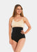 Front view of a model wearing the black Comfort Waistnipper Brief, showing the high-waisted seamless design that smooths the tummy and waist, with a sleek, invisible finish and supportive fit.