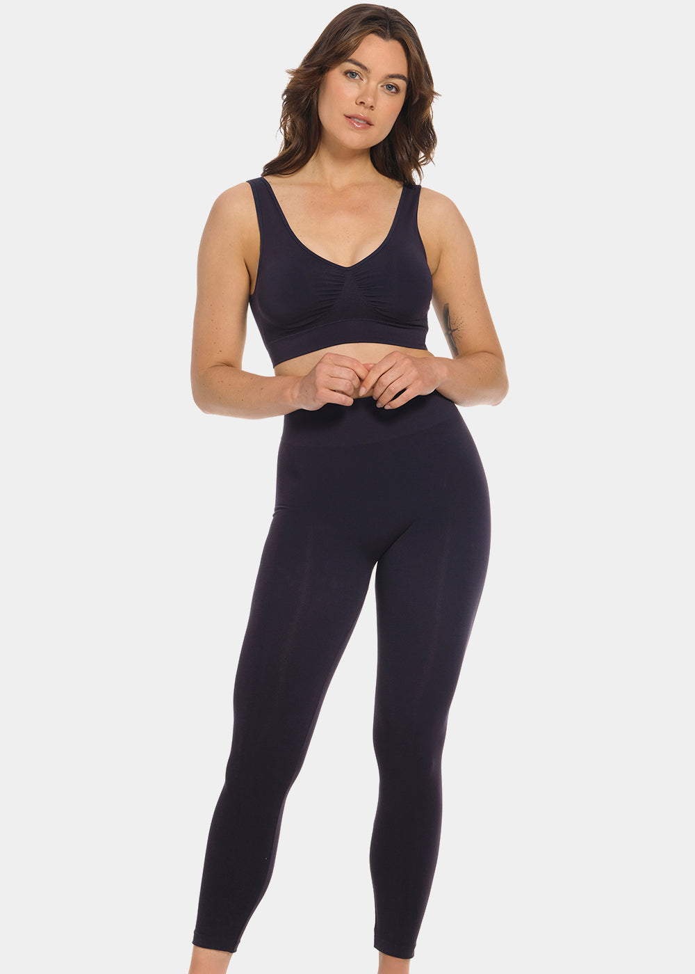 Woman wearing a black Bamboo Legging on a white background