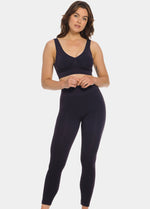 Woman wearing a black Bamboo Legging on a white background
