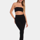 Woman wearing a black Bamboo Leggings on a white background
