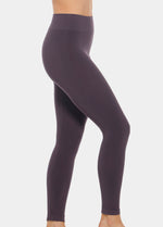 Dark purple Bamboo Legging worn by a person on a light gray background