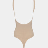 Beige swimsuit on a white background