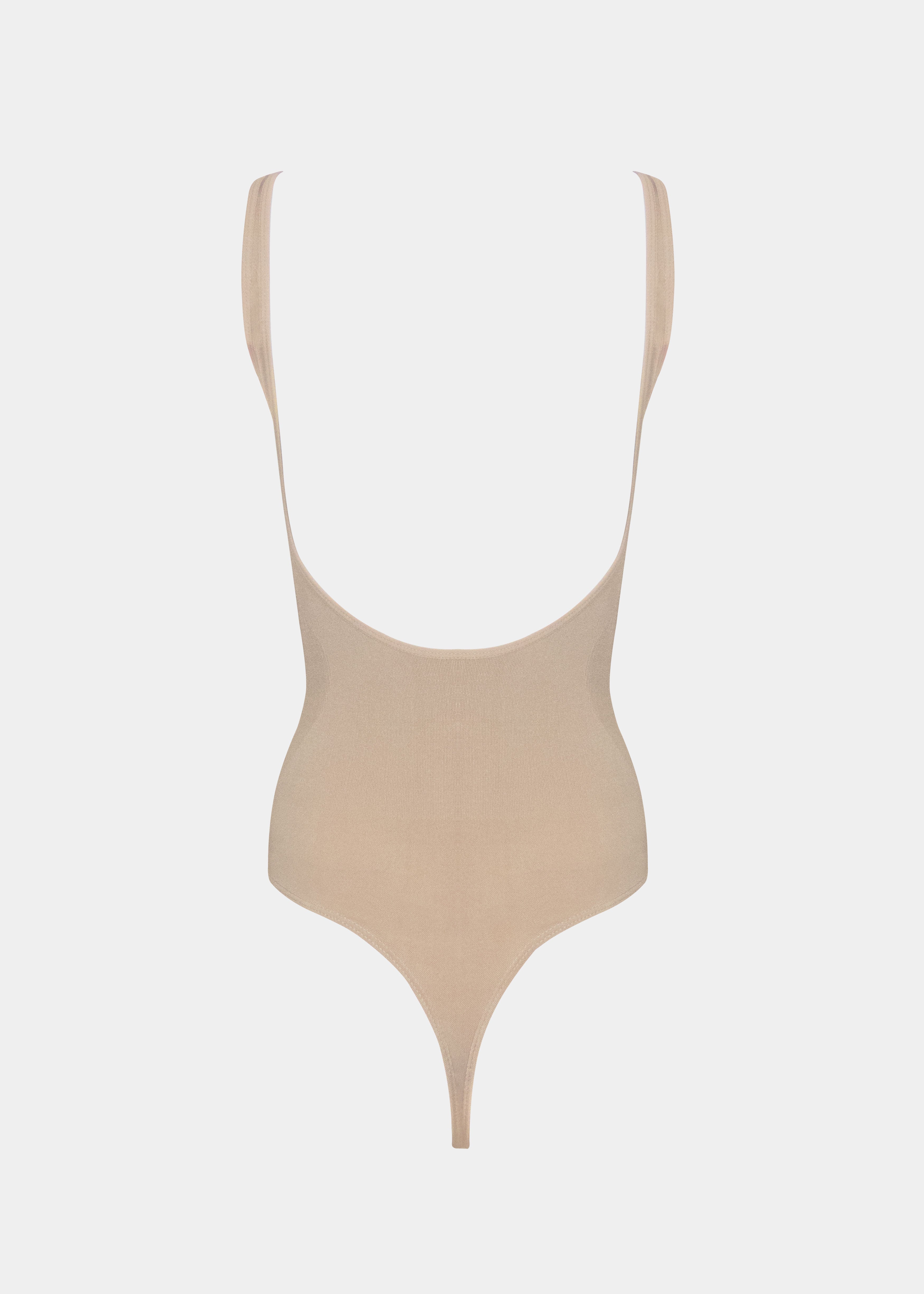 Beige swimsuit on a white background