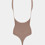 Light brown body with thin straps on a white background