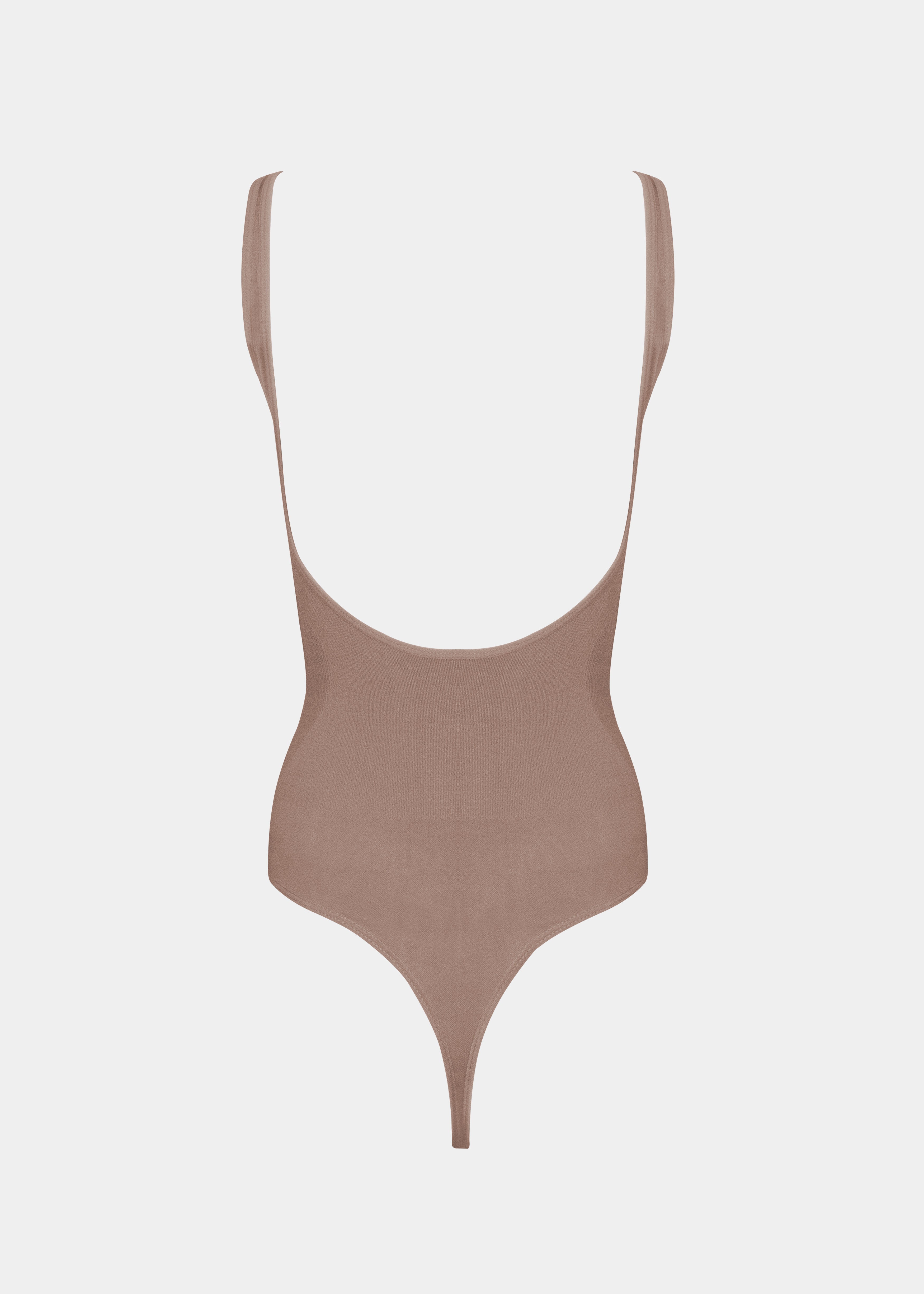 Light brown body with thin straps on a white background