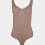 Light brown bodysuit on a light gray background