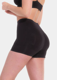 Person wearing black Booty Booster Short on a white background